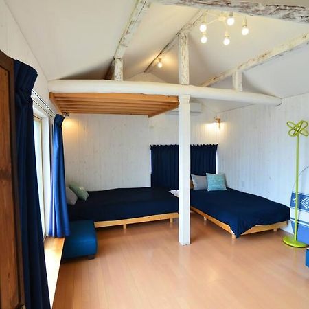 佐渡 ビーチまで0分 1客のみ オーシャンビュー Beach Side House ウッドデッキ Szado Kültér fotó