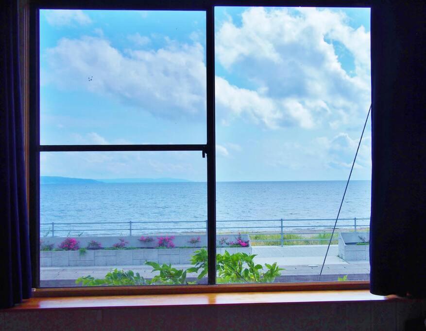 佐渡 ビーチまで0分 1客のみ オーシャンビュー Beach Side House ウッドデッキ Szado Kültér fotó