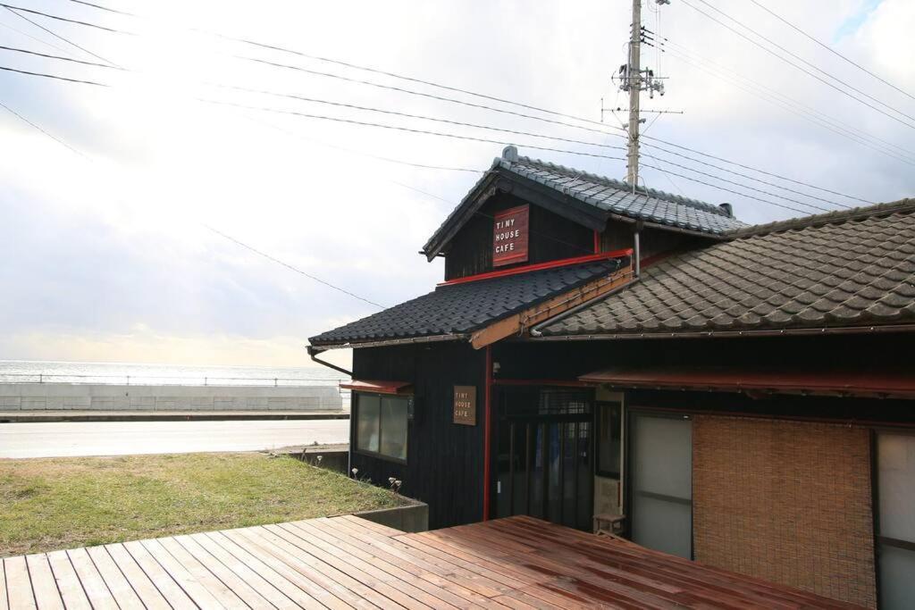 佐渡 ビーチまで0分 1客のみ オーシャンビュー Beach Side House ウッドデッキ Szado Kültér fotó
